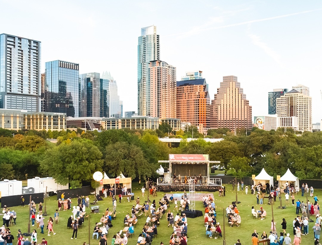 Austin skyline and Auditorium Shores during Austin Food and Wine Festival, an event in November.