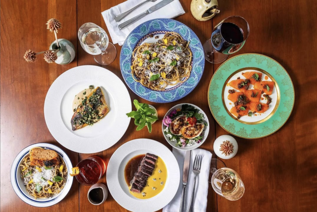 A table full of dishes from Casa Bianca, a new restaurant in Austin that's across the street from the Heywood Hotel.